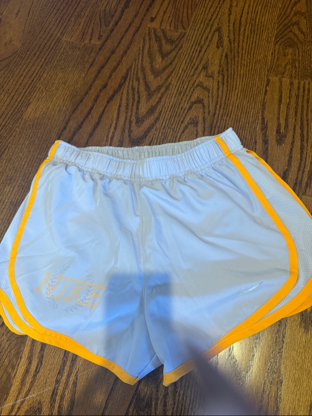 Nike Women's silvery purple Shorts with orange Trim